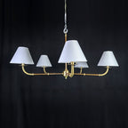 Gold chandelier with wide lampshades