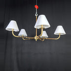Gold chandelier with wide lampshades