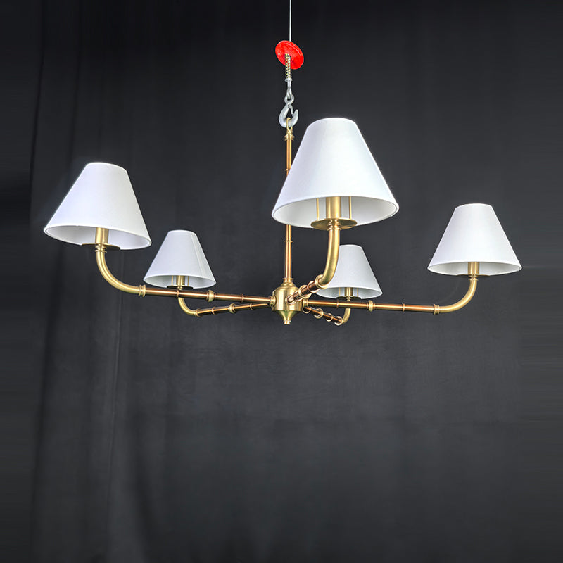 Gold chandelier with wide lampshades