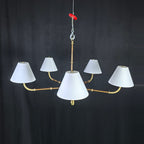 Gold chandelier with wide lampshades