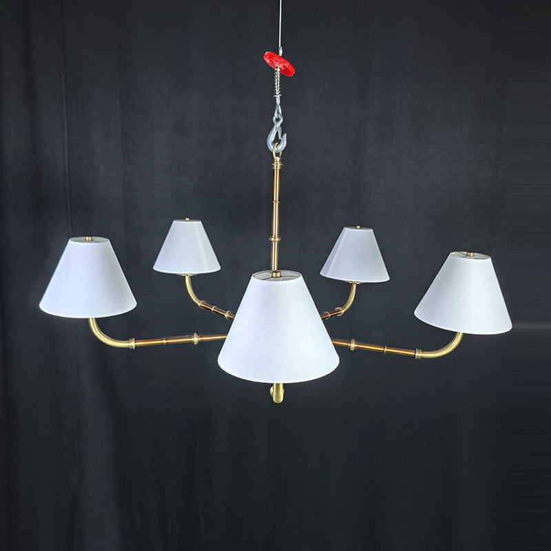 Gold chandelier with wide lampshades