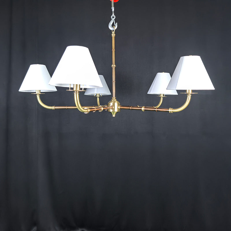 Gold chandelier with wide lampshades