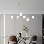 Glass Ball LED Pendant Light in Golden Finish for Modern Home Decor.