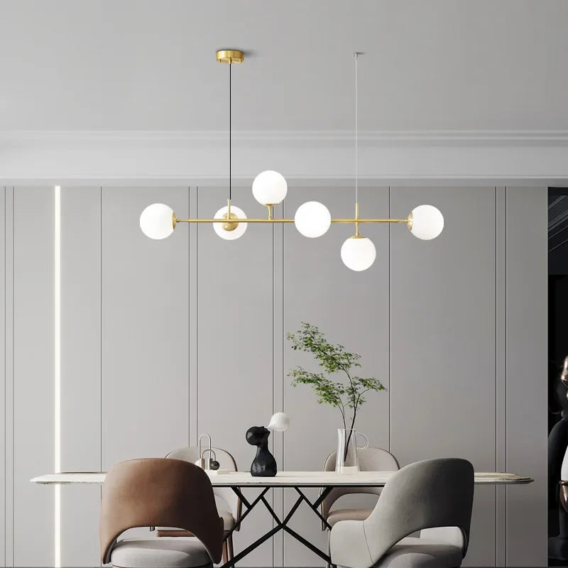 Glass Ball LED Pendant Light in Golden Finish for Modern Home Decor.