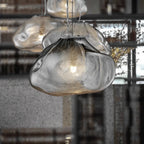 Smoky Grey Glass Pendant Light: Artistic Hanging Lamp for Stylish Decor.