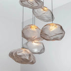 Smoky Grey Glass Pendant Light: Artistic Hanging Lamp for Stylish Decor.