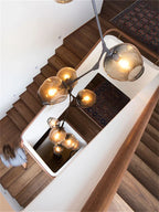 Glass Branching Staircase Chandelier with LED Multi-Color Lampshades.